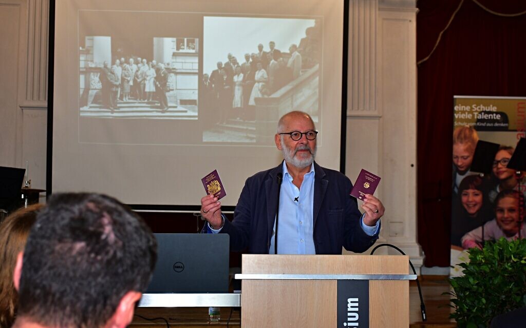 Peter Bradley with his British and German passports, speaking at a school in Germany. Photo: Ulli Koch