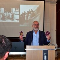 Peter Bradley with his British and German passports, speaking at a school in Germany. Photo: Ulli Koch