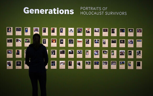 A person looks at the Generations portraits exhibited for the first time at IWM North in Manchester for Holocaust Memorial Day on the 27th January. Picture date: Tuesday January 24, 2023.