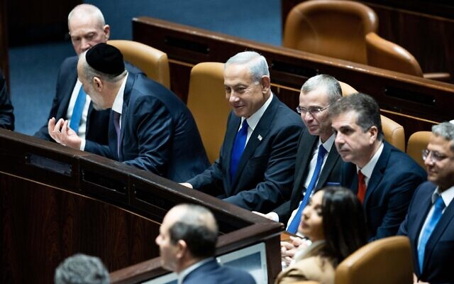 JERUSALEM, Dec. 29, 2022 (Xinhua) -- Israeli Prime Minister Benjamin Netanyahu (3rd L, Rear) is seen during an official inauguration ceremony at the Israeli parliament in Jerusalem, on Dec. 29, 2022. (JINI via Xinhua)
