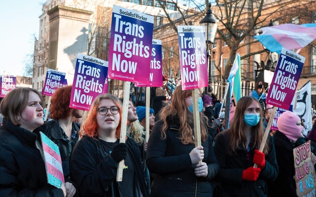 2MCF85G London, UK. 21 January, 2023. Trans rights activists attend a protest opposite Downing Street. The protest was organised by London Trans Pride following the UK government's decision to use Section 35 of the Scotland Act to block Scotland's Gender Recognition Reform Bill which would have made it easier for trans people to obtain a Gender Recognition Certificate (GRC) in Scotland. Credit: Mark Kerrison/Alamy Live News