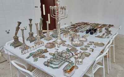 Construction workers renovating an old tenement house in Lodz, Poland, unearthed a surprising find: an untouched cache of hundreds of Jewish artifacts believed to have been hidden in advance of the Nazi occupation of the city. Credit: Twitter