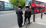 Young Orthodox Jewish men in Stamford Hill.