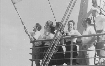 Jewish refugee children unfurl the Zionist flag as they arrive at the Haifa port aboard Aliyah Bet ("illegal" immigration) ship SS Franconia in 1945.
Credit; Central Zionist Archives
