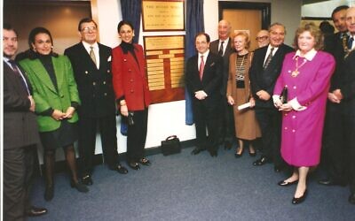 The opening of the Sugar Wing at Sinclair House in 1994. In the image, from left to right is Lord Sugar, Ann Sugar, Gerald Ronson, Dame Gail Ronson, Philip Leigh, Ellis Bik, Lady Birk, Tibor Bolsckei, Frank Cass, and behind the Mayor and Lady Mayoress, Joe Slezinger.