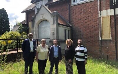 Local MP David Simmonds with members of the Iron Aid Foundation board.