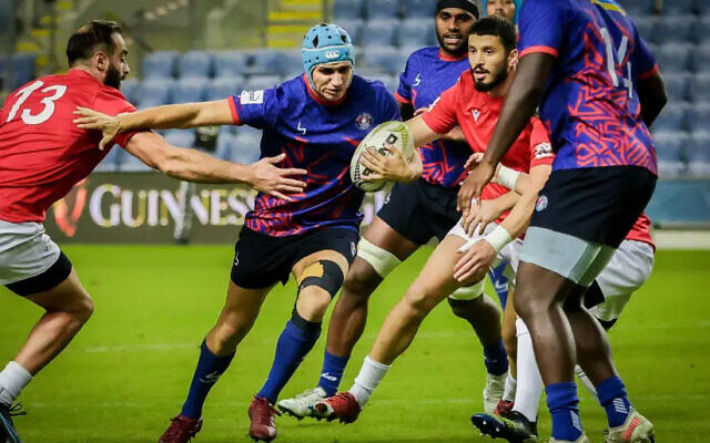 The Tel Aviv Heat (in blue) has been a success, both on and off the pitch, as it helps reignite the spirit of rugby throughout Israel.
(photo credit: TSAHI REIZEL/COURTESY)