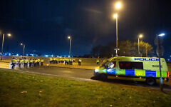 Police in riot gear outside the Suites Hotel in Knowsley, Merseyside (Peter Powell/PA) Police in riot gear outside the Suites Hotel in Knowsley, Merseyside (Peter Powell/PA)