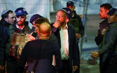Israel's Minister of National Security Itamar Ben-Gvir speaks with Israeli forces near the scene of a shooting attack in Neve Yaacov which lies on occupied land that Israel annexed to Jerusalem after the 1967 Middle East war January 27, 2023. REUTERS/Ronen Zvulun Israel's Minister of National Security Itamar Ben-Gvir speaks with Israeli forces near the scene of a shooting attack in Neve Yaacov which lies on occupied land that Israel annexed to Jerusalem after the 1967 Middle East war January 27, 2023. REUTERS/Ronen Zvulun