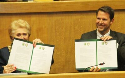 Conservative Mayor Cllr Sandra Parnell, signing the twinning agreement, alongside Shoham Mayor Eitan Petigro