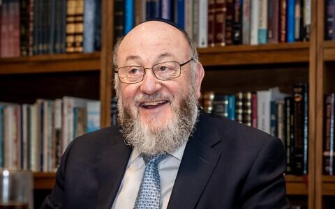 Chief Rabbi Sir Ephraim Mirvis pictured in his book-lined study. Photograph: Adam Stoller Photography