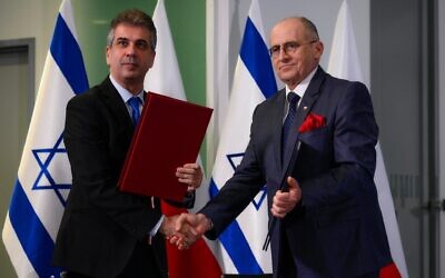 Israeli Foreign Minister Eli Cohen, left, meets with Polish Foreign Minister Zbigniew Rau in Warsaw, March 22, 2023. (Jaap Arriens/NurPhoto via Getty Images)