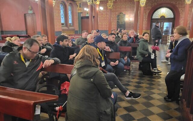 Mala Tribich addressing the March of the Living group at the Temple synagogue in Krakow. Pic: HMDT