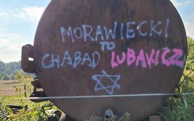 Graffiti found in Warsaw reads "Morawiecki is Chabad Lubavitch," referring to the country's non-Jewish Prime Minister Mateusz Morawiecki and the Hasidic Chabad-Lubavich movement. Morawiecki's right-wing Law and Justice Party has worked closely with Jewish groups. (Courtesy of Czulent)