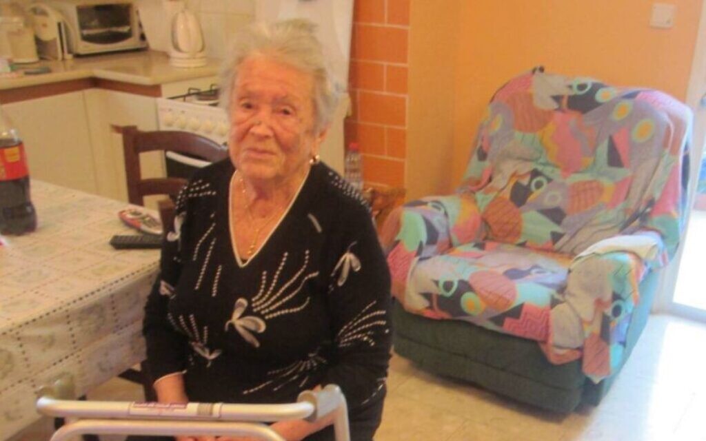 Mina Yuditskaya-Berliner, photographed in her Tel Aviv apartment in 2014, said her home was a gift from her former student, Vladimir Putin. (Ben Sales)