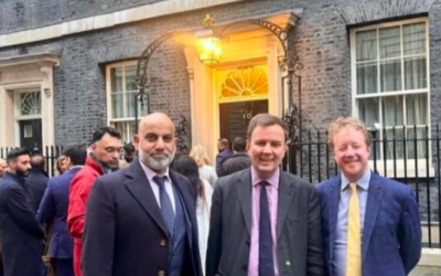 Cllr Isfaq Hussain, Tory chair Greg Hands, and Peterborough MP Paul Bristow outside Downing Street.