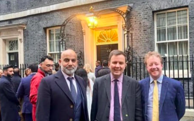 Cllr Isfaq Hussain, Tory chair Greg Hands, and Peterborough MP Paul Bristow outside Downing Street.