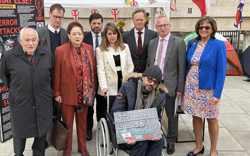 Hunger striker Vahid Beheshti with his supporters outside the foreign office