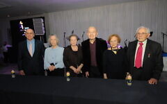 45 AID 2023 Dinner survivors (pictured left to right) Jackie Young, Zdenka Husserl, Rachel Levy, Victor Greenberg, Mala Tribich and Harry Olmer, lit 6 memorial candles to represent the 6 million Jewish lives tragically lost during the Holocaust.
Photo John Rifkin 45 AID 2023 Dinner survivors (pictured left to right) Jackie Young, Zdenka Husserl, Rachel Levy, Victor Greenberg, Mala Tribich and Harry Olmer, lit 6 memorial candles to represent the 6 million Jewish lives tragically lost during the Holocaust.
Photo John Rifkin