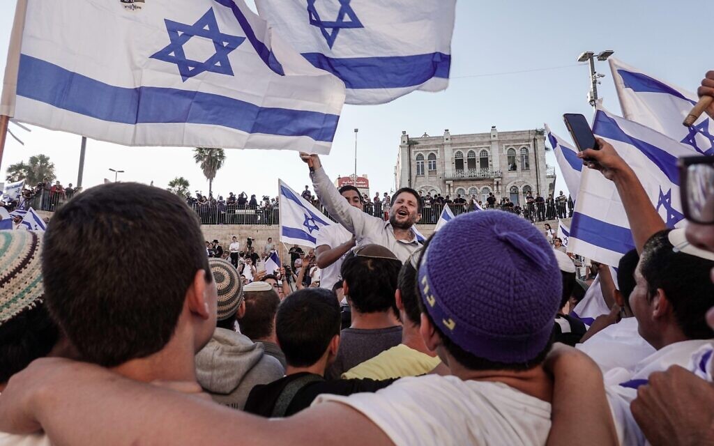 Jerusalem, Israel. 15th, June 2021. Betzalel Smotrich, head of the Religious Zionism Party joins thousands identifying with the nationalist religious Zionist streams marching in the annual Dance of Flags March from downtown Jerusalem to the Damascus Gate, Jaffa Gate and to the Western Wall. Participants celebrate the anniversary of the reunification of Jerusalem in the 1967 Six Day War in a demonstration of Jewish pride.