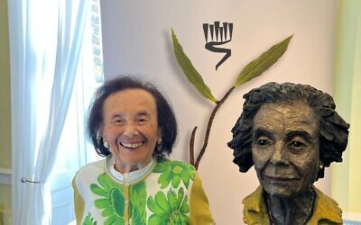 Holocaust survivor Lily Ebert with the bronze sculpture by Frances Segelman