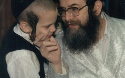 Moishi Schick with his father, Rabbi Eliezer Schick