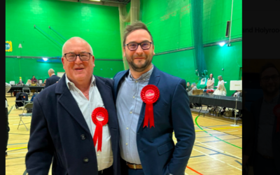 Michael Rubinstein pictured with Bury South Labour MP Christian Wakeford after winning the Pilkington Park seat