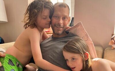 Pic: Daniel Weston with his children at home.