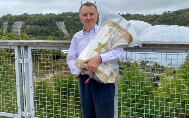 Community chair Jeremy Jacobson OBE with the historic scroll during filming of the Antiques Roadshow at the Eden Project, Cornwall.