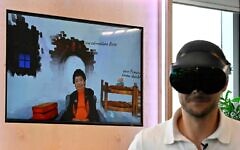 Through artificial intelligence, users of the VR headset can have a "conversation" with Holocaust survivor Inge Auerbacher, asking about her encounters with heartbreaking loss and occasional heroism. - Copyright AFP Tobias SCHWARZ