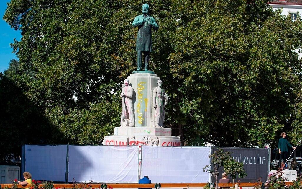 A fence in Vienna surrounds the statue of Karl Lueger, the antisemitic former mayor of the Austrian capital, Oct. 6, 2020. (Joe Klamar/AFP via Getty Images)