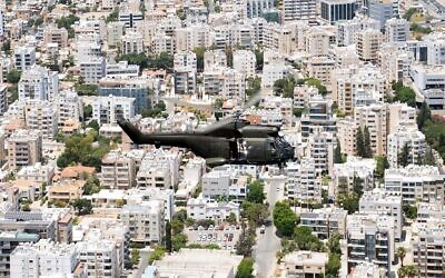 A helicopter flies over Limassol, Cyprus, June 21, 2023. (Joe Giddens/PA Images via Getty Images)