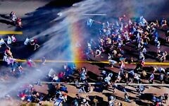 A rainbow from the water cannons over protesters at Ein Hemed Junction. Credit: Ilan Rosenberg A rainbow from the water cannons over protesters at Ein Hemed Junction. Credit: Ilan Rosenberg