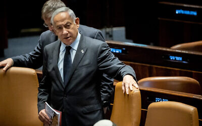 Israeli Prime Minister Benjamin Netanyahu seen during a vote in Knesset, the Israeli parliament in Jerusalem, March 22, 2023. (Yonatan Sindel/Flash90)
