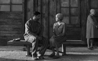 Ajay (Varun Dhawan) and Nisha (Janhvi Kapoor) imagine themselves as Auschwitz prisoners in a scene from the Amazon-distributed "Bawaal." (Screenshot)