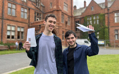 Brothers Angus (left) and Aaron Pollock  receive their A-level results.