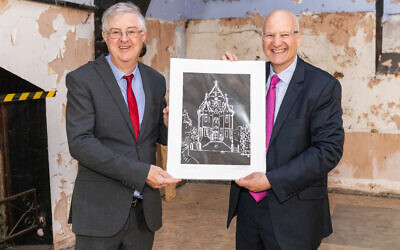 First Minister receiving commissioned artwork from Michael Mail
