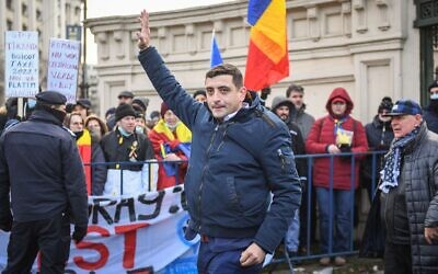 George Simion, president of Romania's right-wing AUR party, attends a protest about COVID-19 rules in Bucharest, Dec. 21, 2021. (Daniel Mihailescu/AFP via Getty Images)