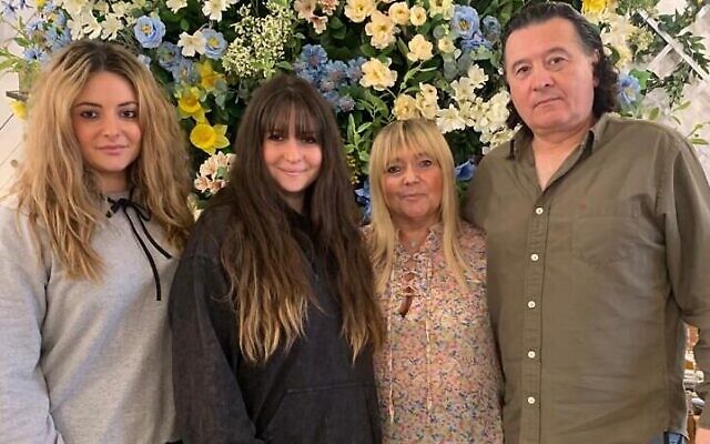 Michele Kaye, standing next to her long-haired husband Martin, alongside their two daughters Charlotte and Daniella. Pic: Charlotte Harari (This image has been cropped!)