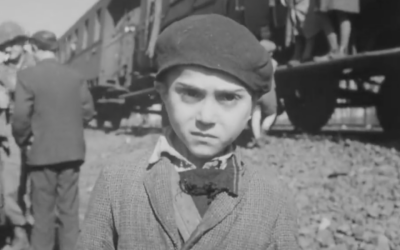 YouTube screenshot of a little boy freed from the horrors of Nazism.
