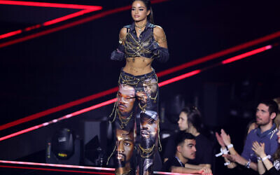 Israeli singer Noa Kirel wears a Kanye West-printed outfit on stage during the MTV Europe Music Awards 2022 in Dusseldorf, Germany, Nov. 13, 2022. (Andreas Rentz/Getty Images for MTV)