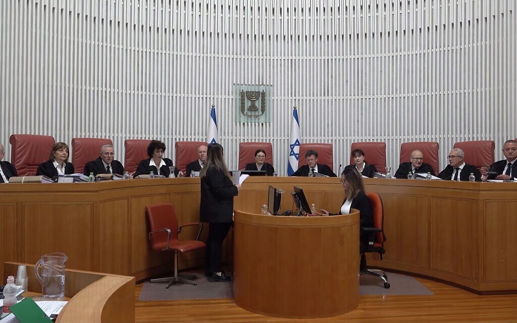 President of the Supreme Court Esther Hayut and Supreme court Justices attend a court hearing on petitions demanding the annulment of the appointment of Shas leader Aryeh Deri as a minister in Netanyahu's hard-line new government due to his recent tax fraud conviction at the Supreme Court on January 5, 2023, in Jerusalem, Israel. Credit: Eddie Gerald/Alamy Live News