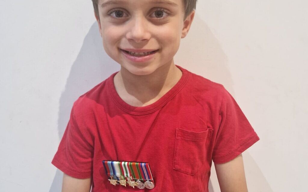 Jake Goodman wearing his great grandfather's war medals.