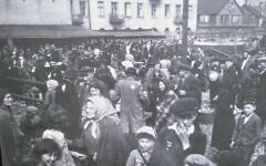 Lodz Ghetto memorial photograph, showing Zigi Shipper, foreground, touching his hand to his face. Pic: Darren Richman Lodz Ghetto memorial photograph, showing Zigi Shipper, foreground, touching his hand to his face. Pic: Darren Richman