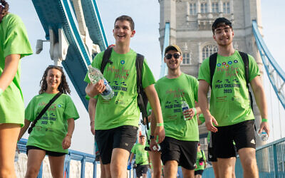 Shani's-brother-Joel-and-his-friends-proudly-crossed-the-finish-line-having-walked-26.2-miles.