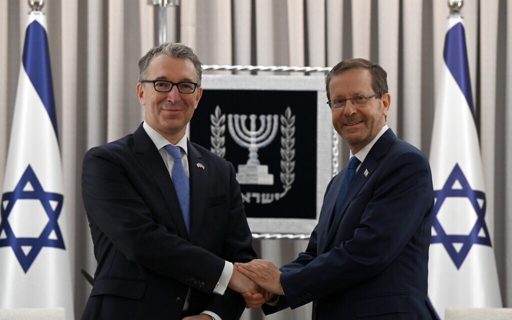 Israel's President Herzog and British ambassador to Israel, Simon Walters. Credit: Haim Zach/ GPO