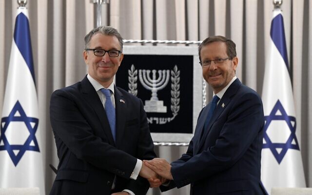 Israel's President Herzog and British ambassador to Israel, Simon Walters. Credit: Haim Zach/ GPO