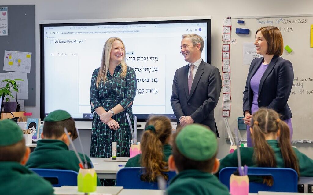 David Pinto-Duschinsky, centre, and Bridget Phillipson, right, meet with the school's headteacher