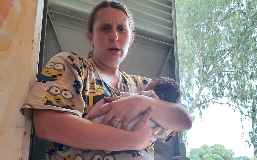 Bradley's aunt Aimee holding baby Kai