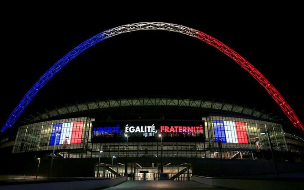 The Wembley arch is lit in the colours of the French flag after terror attacks in Paris